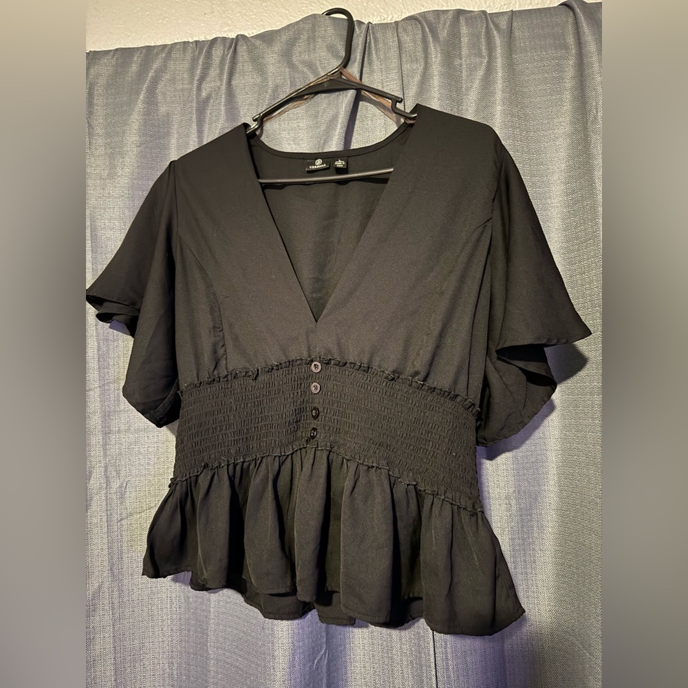 V-neck black work top. Size large. Smoke-free home